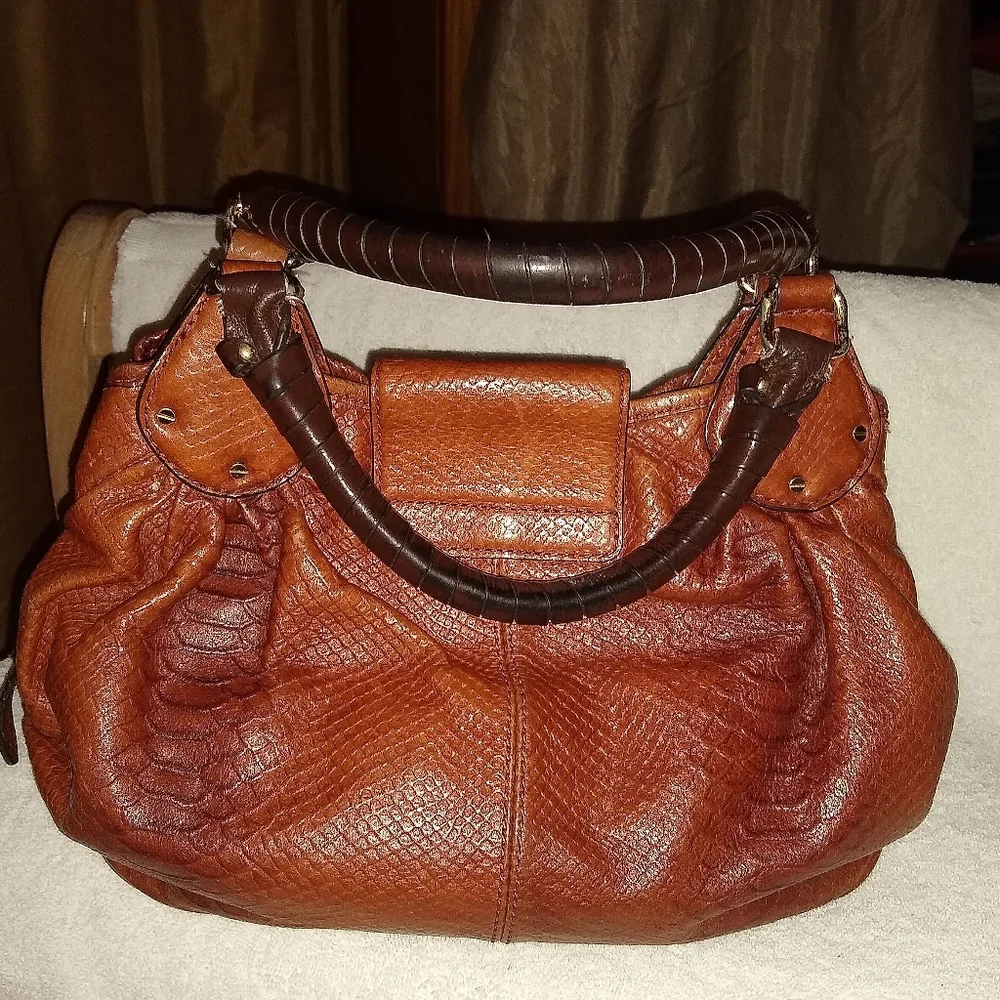 Antonio Melani brown croc embossed hobo leather bag.